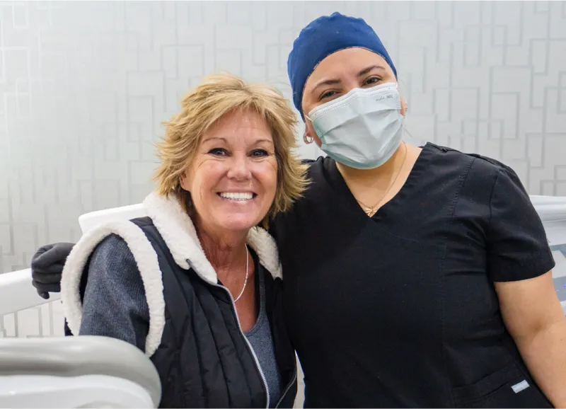 patient smiling after dental treatment in Tijuana