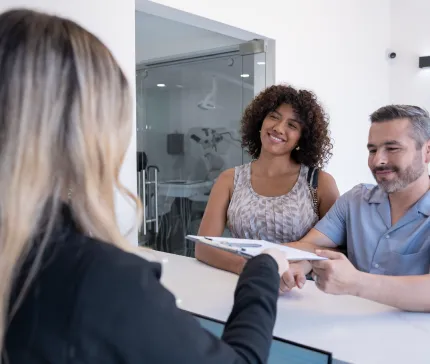 Patient consulting with dentist to achieve the brightest smile ever